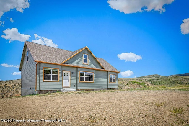 118 Highland Dr, Craig, CO 81625 - view of front of property with entry steps and roof with shingles