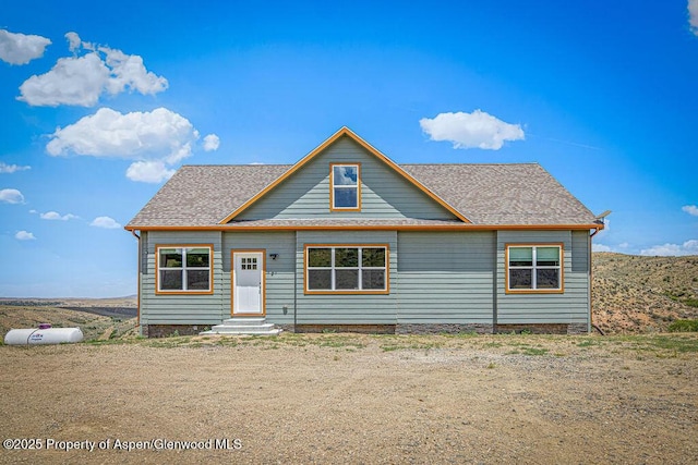 118 Highland Dr, Craig, CO 81625 - view of front of home featuring entry steps and a shingled roof