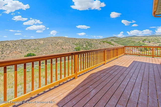 118 Highland Dr, Craig, CO 81625 - wooden terrace with a mountain view