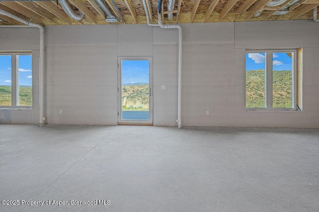 118 Highland Dr, Craig, CO 81625 - empty room featuring concrete floors