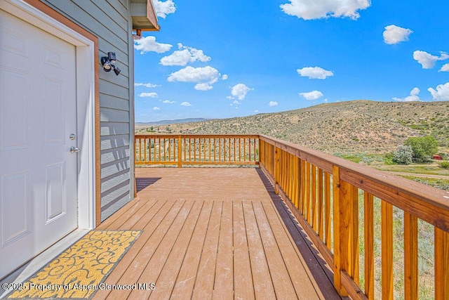 118 Highland Dr, Craig, CO 81625 - wooden deck with a mountain view