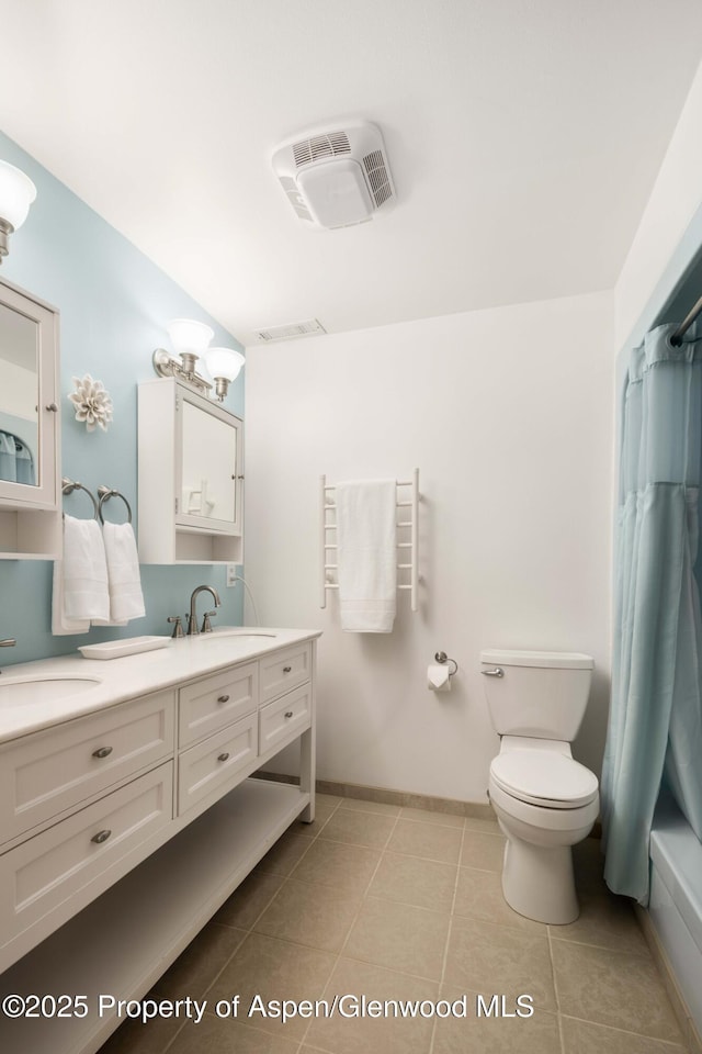 full bathroom featuring toilet, visible vents, baseboards, vanity, and tile patterned floors