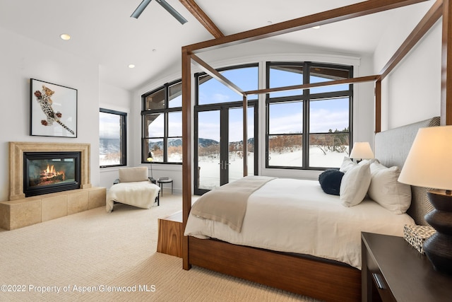 2908 Juniper Hill Dr, Aspen, CO 81611 - carpeted bedroom featuring a fireplace, recessed lighting, a water view, and french doors