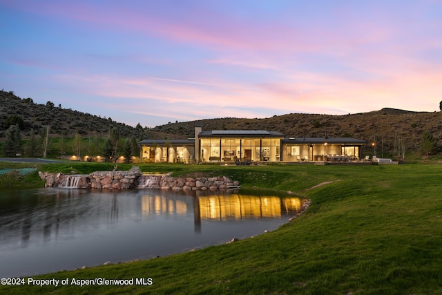 6890 E Sopris Creek Rd, Snowmass, CO 81654 - water view featuring a mountain backdrop