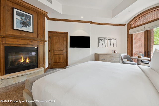 carpeted bedroom with french doors