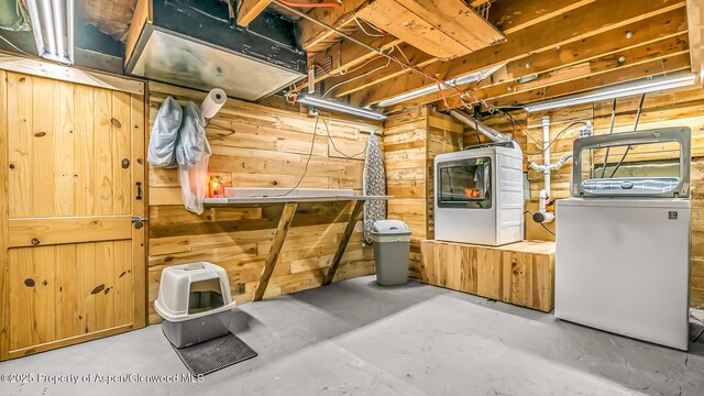 600 Rose St, Craig, CO 81625 - unfinished basement with washer / clothes dryer and wooden walls