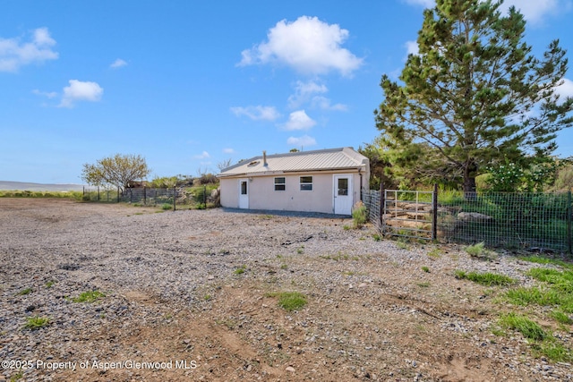 40889 County Road 76a, Hayden, CO 81639 - back of property featuring metal roof and stucco siding