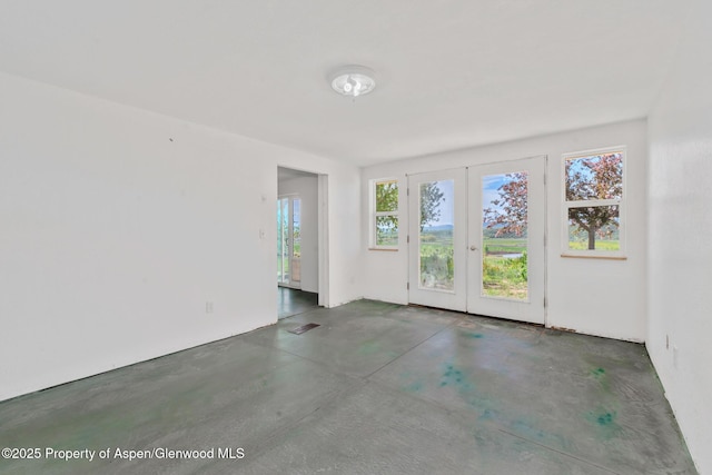 40889 County Road 76a, Hayden, CO 81639 - spare room featuring french doors and concrete floors