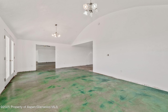 40889 County Road 76a, Hayden, CO 81639 - unfurnished living room featuring a chandelier, finished concrete flooring, and lofted ceiling