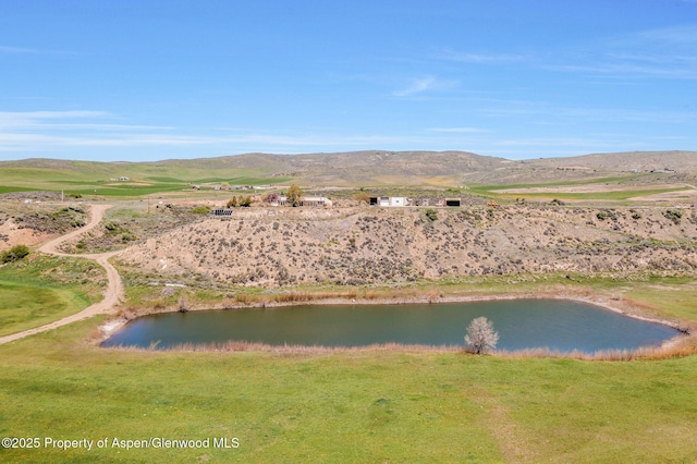 40889 County Road 76a, Hayden, CO 81639 - water view featuring mountains