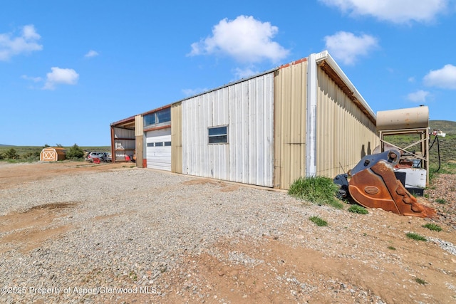 40889 County Road 76a, Hayden, CO 81639 - view of outbuilding featuring dirt driveway