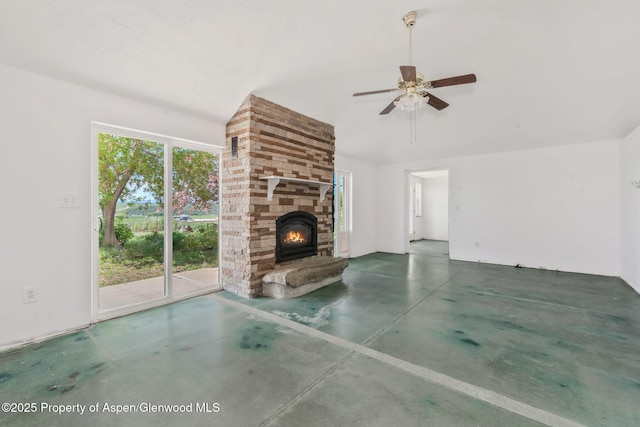 40889 County Road 76a, Hayden, CO 81639 - unfurnished living room with finished concrete floors, a fireplace, ceiling fan, and lofted ceiling