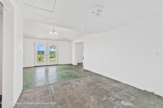 40889 County Road 76a, Hayden, CO 81639 - empty room featuring french doors and concrete flooring