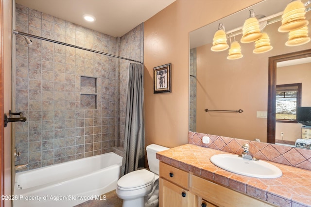 bathroom with toilet, shower / tub combo with curtain, and vanity