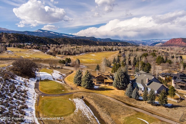 drone / aerial view featuring a mountain view