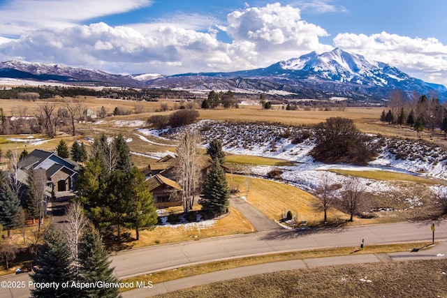 drone / aerial view featuring a mountain view