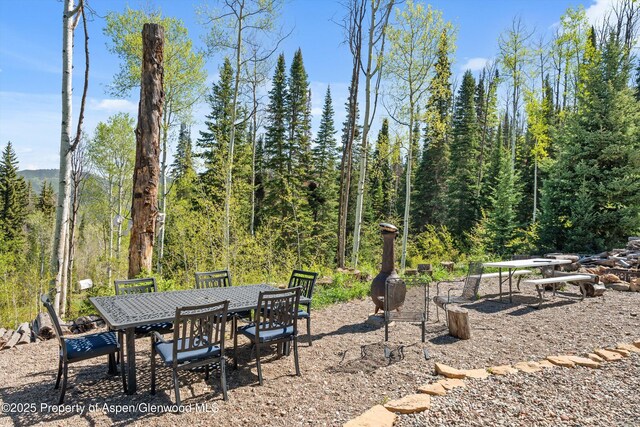 0 E Divide Creek Rd, Silt, CO 81652 - view of patio / terrace featuring outdoor dining space and a view of trees