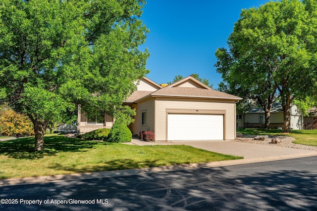 55 Limberpine Cir, Battlement Mesa, CO 81635 - ranch-style home with an attached garage, a front lawn, and concrete driveway
