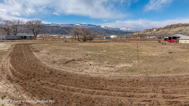 exterior space with a rural view