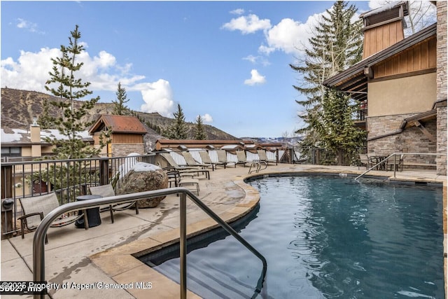 pool with a patio