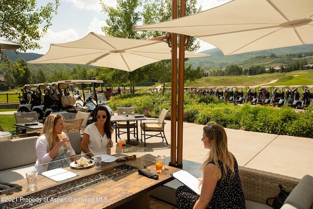 view of property's community with a patio