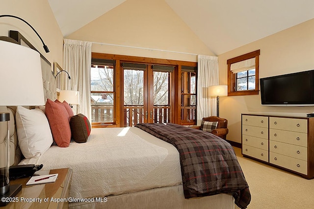 bedroom with french doors, high vaulted ceiling, and light carpet