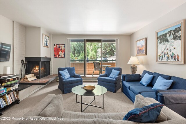 1024 E Hopkins Ave # 16, Aspen, CO 81611 - living area with carpet flooring and a brick fireplace
