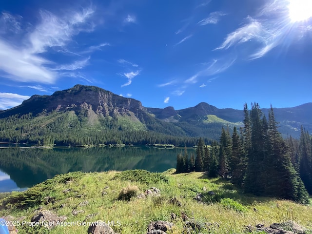 6398 County Road 4, Meeker, CO 81641 - view of mountain backdrop with a large body of water