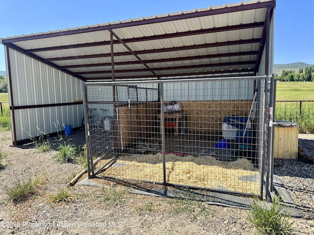 6398 County Road 4, Meeker, CO 81641 - view of outdoor structure featuring a detached carport and a view of rural / pastoral area