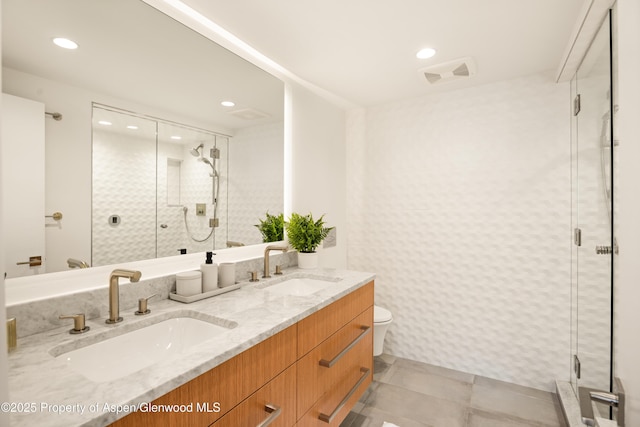 800 S Mill St Unit 304D, Aspen, CO 81611 - full bathroom with a sink, a shower stall, and visible vents