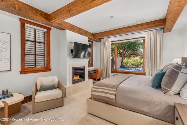 bedroom with beamed ceiling