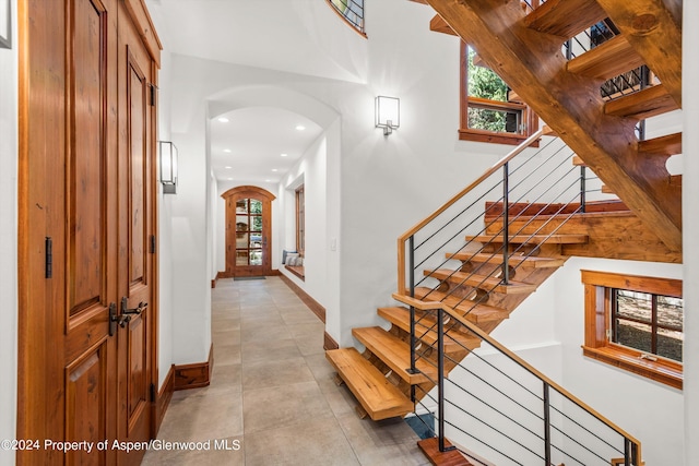 entryway featuring light tile patterned flooring