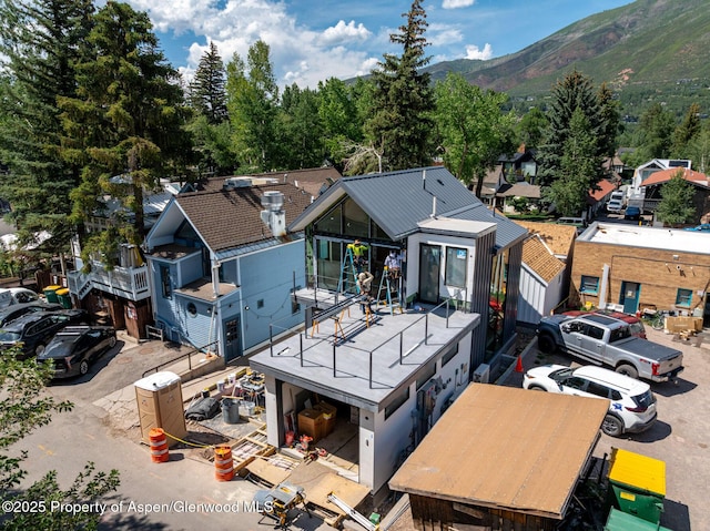 227 E Main St, Aspen, CO 81611 - drone / aerial view of a mountainous background