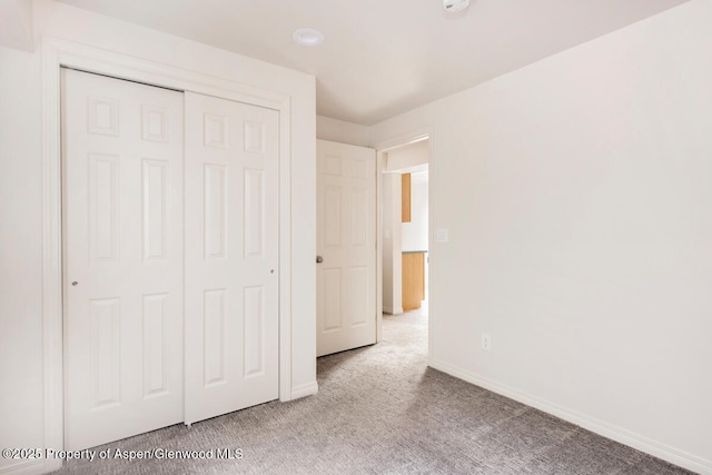 681 S 2nd St Unit A, Carbondale, CO 81623 - unfurnished bedroom featuring a closet, carpet, and baseboards