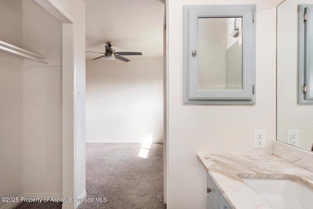 681 S 2nd St Unit A, Carbondale, CO 81623 - bathroom with vanity, a ceiling fan, and baseboards