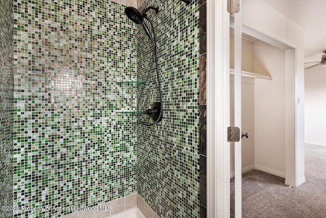 681 S 2nd St Unit A, Carbondale, CO 81623 - bathroom featuring a tile shower and a ceiling fan