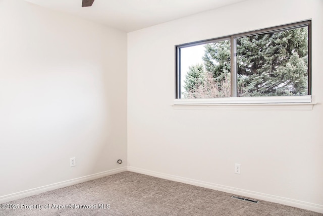 681 S 2nd St Unit A, Carbondale, CO 81623 - empty room featuring a ceiling fan, visible vents, carpet floors, and baseboards