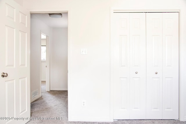681 S 2nd St Unit A, Carbondale, CO 81623 - unfurnished bedroom with a closet, visible vents, carpet floors, and baseboards