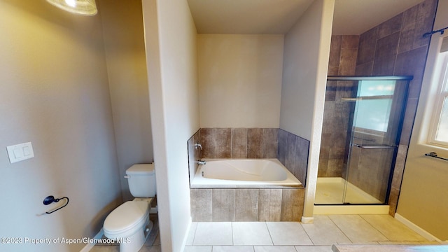 bathroom featuring tile patterned floors, plus walk in shower, and toilet