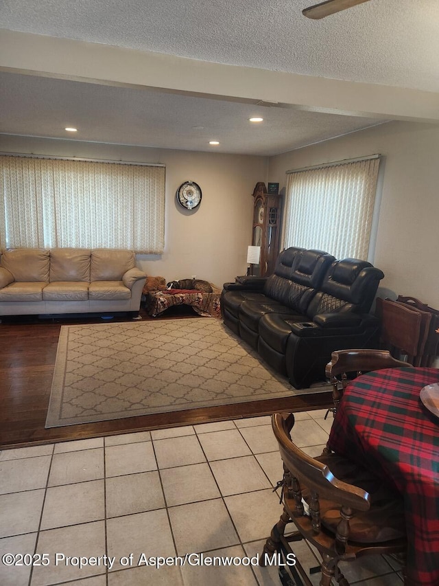 3057 Wellington Ave, Grand Junction, CO 81504 - living room with recessed lighting, a textured ceiling, and tile patterned floors