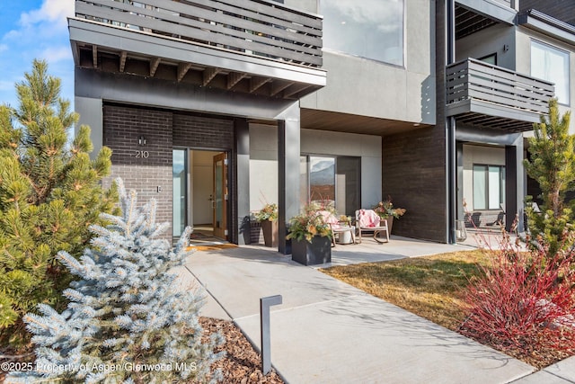 doorway to property with a balcony