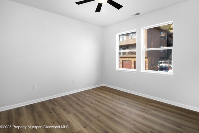 2701 Midland Ave Unit 0628, Glenwood Springs, CO 81601 - unfurnished room with dark wood-type flooring, baseboards, and ceiling fan