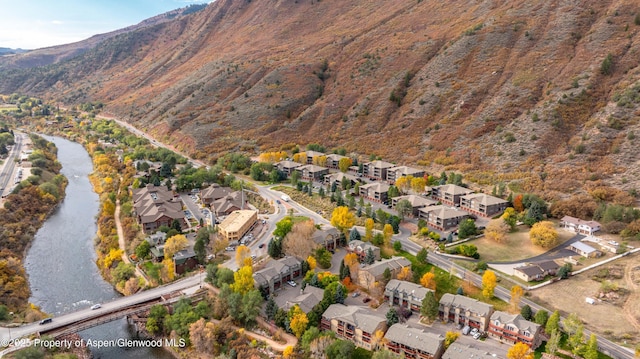 2701 Midland Ave Unit 0628, Glenwood Springs, CO 81601 - aerial view of property and surrounding area featuring nearby suburban area and a water and mountain view