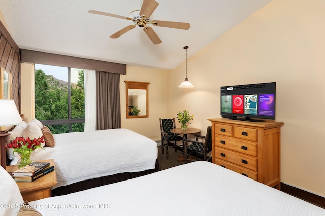 300 Carriage Way Unit 603, Snowmass Village, CO 81615 - bedroom with lofted ceiling and a ceiling fan