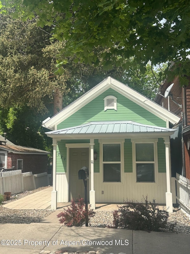 727 Bennett Ave, Glenwood Springs, CO 81601 - view of front of house featuring a porch and a metal roof