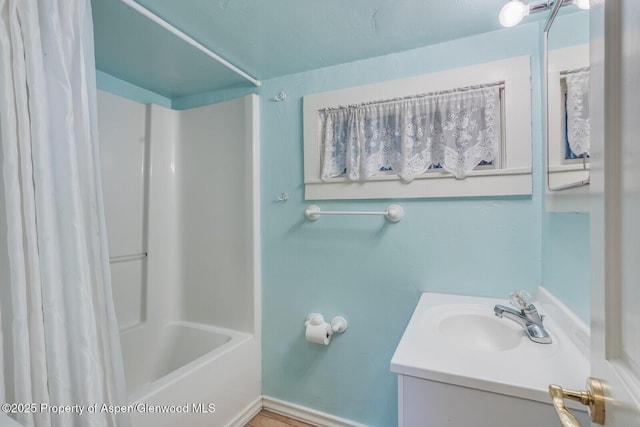 727 Bennett Ave, Glenwood Springs, CO 81601 - bathroom with vanity and shower / bath combo with shower curtain
