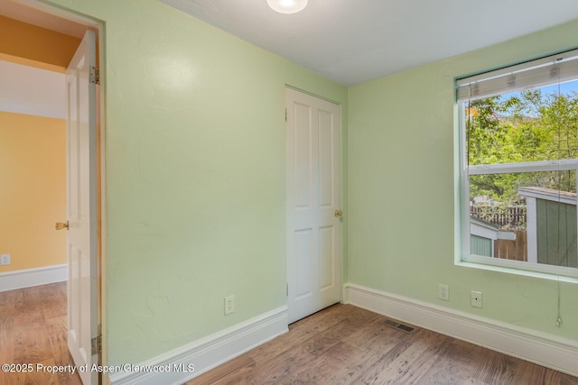 727 Bennett Ave, Glenwood Springs, CO 81601 - unfurnished bedroom featuring wood finished floors