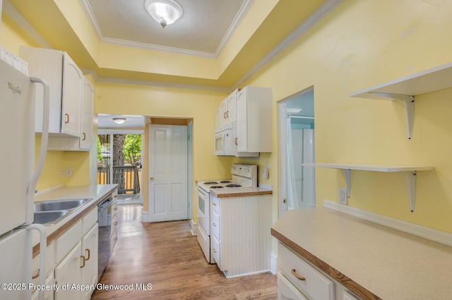 727 Bennett Ave, Glenwood Springs, CO 81601 - kitchen with white appliances, white cabinetry, ornamental molding, light wood-style flooring, and light countertops