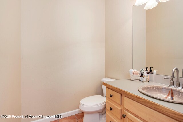 1199 Vitos Way, Carbondale, CO 81623 - half bathroom with vanity and tile patterned flooring