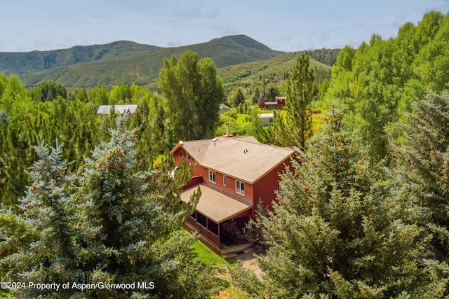 drone / aerial view featuring a mountain view